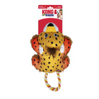 KONG Cozie Tuggz Cheetah dog toy in its original packaging. The plush toy is yellow with black spots, orange accents on the limbs, and a soft brown mane. It has embroidered eyes and ears. A twisted rope handle in yellow, orange, and white extends from the bottom for tugging play. The packaging features the KONG Cozie logo, a red background.