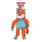 Toy in retail packaging. The packaging includes a red and white cardboard backing with the 'KONG Floppy Knots' logo. The plush toy resembles a fox with an orange and white color scheme, a soft fabric body, and twisted rope limbs. Its belly features a teal and white houndstooth pattern, and it has embroidered facial details. The toy's arms, legs, and tail have rope knots at the ends.