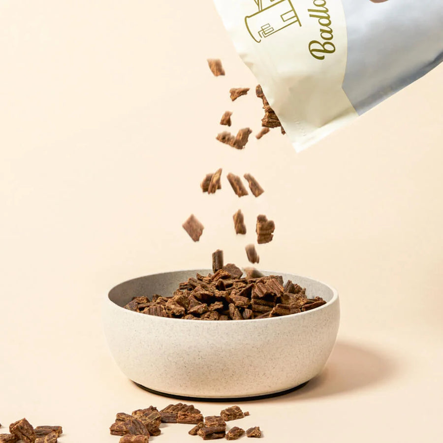 Badlands Ranch Air-Dried Superfood Complete Chicken Formula Dog Food poured into a bowl