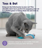 A gray cat playing with a blue shrimp-shaped plush toy that has a mesh texture and a bright blue feather tail. The cat is crouched, pawing at the toy with focus. Toss & Bat. Bring out the little hunter in your cat! This adorable chew toy is perfect for engaging your cat in a playful game or letting them bat and swat on their own. Contains catnip for an irresistible scent and experience that your kitty will enjoy.