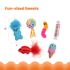 Six candy-themed cat toys displayed on a white background with dimensions marked at approximately 4 inches tall by 1 inch wide. Toys include a blue gummy bear with a fluffy top, a rainbow lollipop with ribbons, a pink and orange gummy worm, a striped wrapped candy labeled 'Catstages,' a red fish with a feather tail labeled 'Sweet-ish,' and a smiling ice cream cone. Fun-sized Sweets.