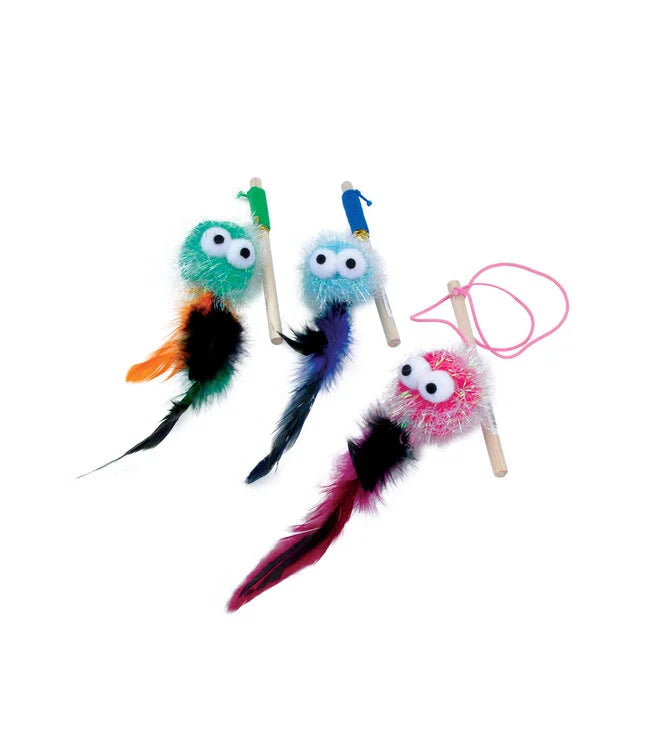 Coastal Turbo Monster Wand Cat Toys, each featuring a fuzzy, round monster face with googly eyes, colorful feather tails, and attached to wooden wands with cords in green, blue, and pink.