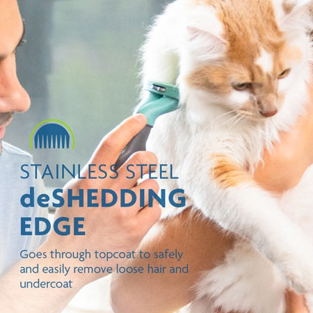 FURminator Undercoat Deshedding Long Hair Cat Tool Teal has a stainless steel deshedding edge that  goes through topcoat to safely & easily  remove loose hair and undercoat