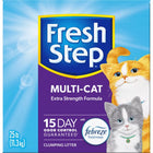 Front panel of box. Illustrations of 2 cats, a small grey one in front and an orange one behind. Fresh Step Multi-Cat extra strength clumping formula. 15 day odor control guaranteed. Clumping litter.