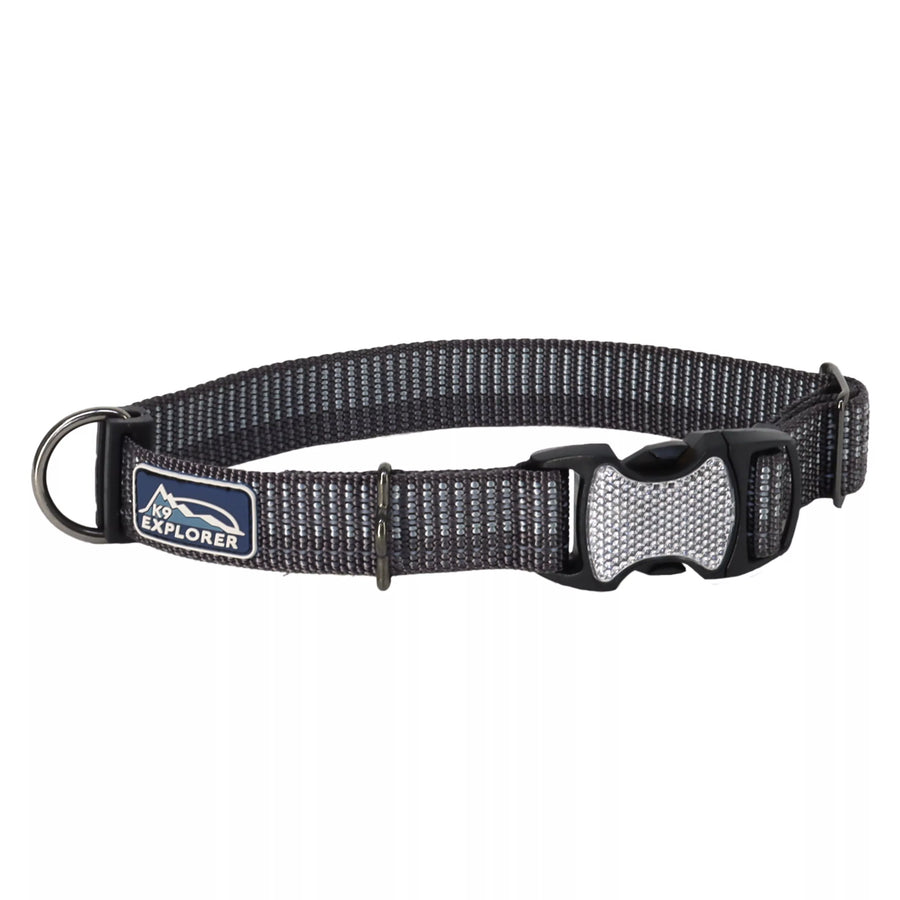 Collar with reflective material woven in the fabric. The pinch buckle is closed, showing reflective material on the buckle.
