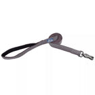 Grey leash rolled up. Image shows padded handle open and at the end of the leash shows the metal scissor clasp for attachment.