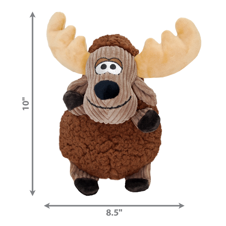 A KONG Sherps Floofs moose plush dog toy, measuring approximately 10 inches in height and 8.5 inches in width. The toy has a round, soft brown fleece-like body with a corduroy-textured tan face. It features embroidered eyes, a black plush nose, and a stitched smile. The moose has large, beige plush antlers, floppy brown arms, and small black hooves. Measurement arrows along the sides indicate the toy’s dimensions.