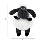 A KONG Sherps Floofs sheep plush dog toy, measuring approximately 9 inches in height and 5 inches in width. The toy has a round, soft white fleece-like body with a black corduroy-textured face and floppy ears. It features embroidered eyes, a black plush nose, and short black plush limbs. Measurement arrows along the sides indicate the toy’s dimensions.