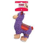 A KONG Sherps llama plush dog toy in its original packaging. The toy has a soft, purple fleece-like body with a beige muzzle and embroidered eyes. Its ears feature a colorful woven fabric with red, orange, and yellow stripes, which matches the saddle-like fabric on its back. The llama stands on beige plush legs with white hooves, and it has a small, fluffy tail. The packaging is red and white, displaying the KONG logo, the word 'Sherps' in a playful blue font, also highlights that the toy squeaks.