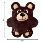 A KONG Snuzzles Bear plush dog toy, measuring approximately 8.5 inches in height and 8.5 inches in width. The toy is a soft, round, brown bear with a fuzzy texture. It features embroidered eyes, a beige muzzle with a black plush nose, and a stitched smiling mouth. The bear has rounded ears with beige inner linings and small embroidered paw prints on its feet. Measurement arrows along the sides indicate the toy’s dimensions.
