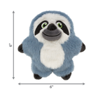 A KONG Snuzzles Kiddos Sloth plush dog toy, measuring 6 inches in both height and width. The toy is a soft, round, blue-gray plush sloth with a fuzzy texture. It has a smiling face with embroidered green eyes, a black nose, and a white face framed by dark brown patches. A white patch is visible on its belly, and its small black paws extend slightly from its round body. The toy appears to be designed for dogs, offering a cuddly and engaging play experience.