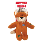 The KONG Wild Knots Fox Dog Toy, a plush orange fox with a friendly face, soft fur, and a white muzzle. It has floppy arms and legs with knotted rope inside for added durability. The toy features decorative stitched patches on its body and limbs. The packaging in the background is red and white, displaying the KONG Wild Knots logo.