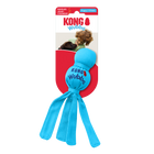 A KONG Wubba Puppy dog toy in its original packaging. The toy is bright blue with a fabric-covered ball-shaped top and long fabric tails hanging below. The packaging has a red and white background, featuring the KONG logo, the word 'Wubba' in blue. The packaging also highlights that the toy squeaks and is designed for puppies