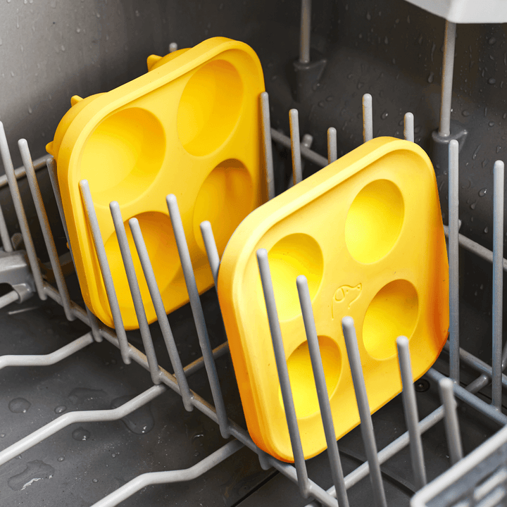 Woof Pupsicle Silicone Treat Tray on drying rack