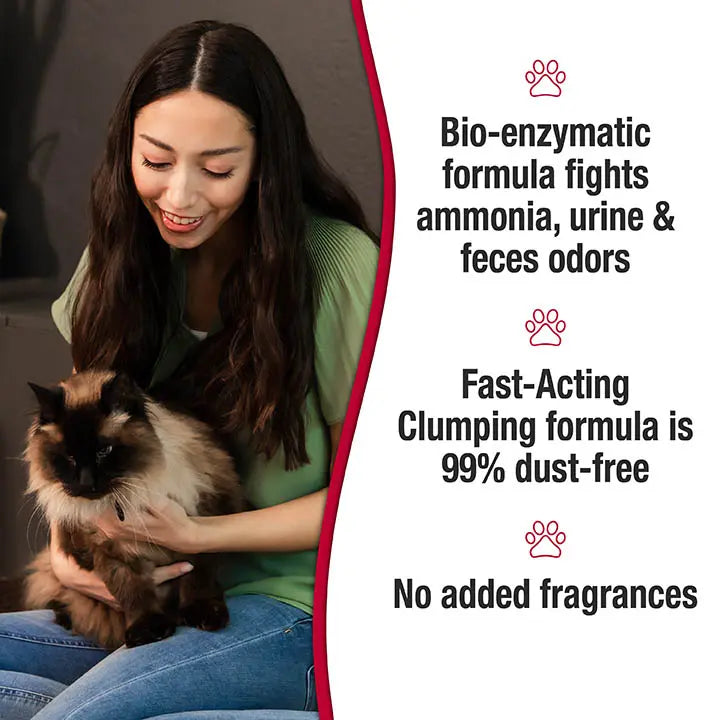 Woman with a dark brown pointed and cream fluffy cat sitting on her lap. Bio-enzymatic formula fights ammonia, urine & feces odors. Fast-acting clumping formula is 99% dust-free. No added fragrances. 