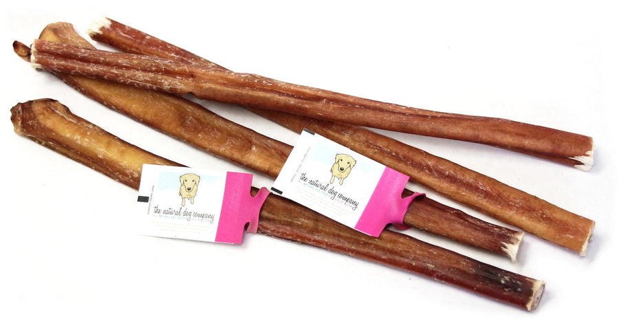 12-inch super jumbo bully sticks from Natural Dog Company, featuring thick, high-quality, all-natural beef chews designed for large or aggressive chewers. The bully sticks are odor-free and arranged neatly for display.