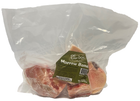 Bag of raw dog marrow bones with a visible label on a white background