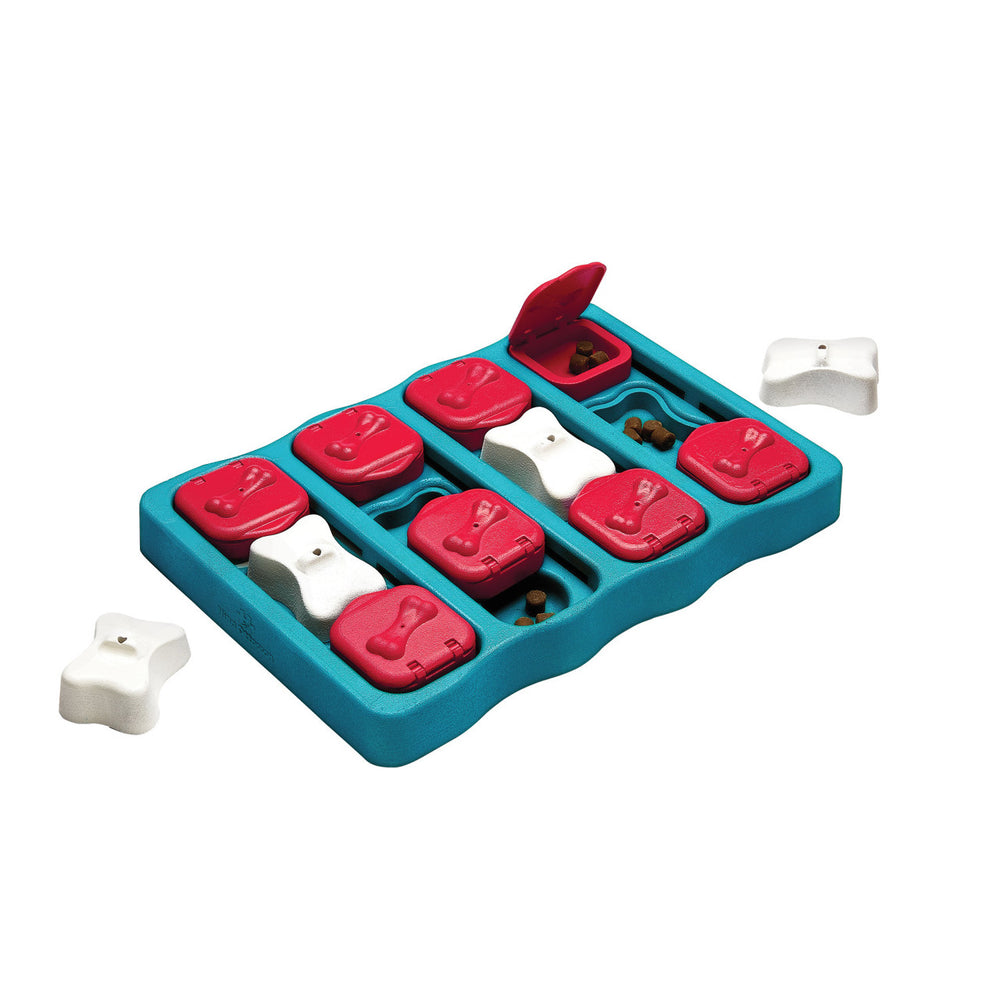 Outward Hound Dog Brick Interactive Treat Puzzle Dog Toy's sliding and lifting components for hiding treats