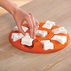 Close up view demonstrating how to use the Outward Hound Dog puzzle toy