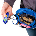 Treat bag open with treats inside, and all the pockets filled with common carry items. Useage of Petsafe Treat Pouch Sport Black