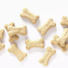 A few pieces of SPORTMiX Wholesomes Gourmet Rewards Puppy Original Treats for Dogs