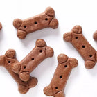 A few pieces of SPORTMiX Wholesomes Rewards Smoky Bites Dog Treats