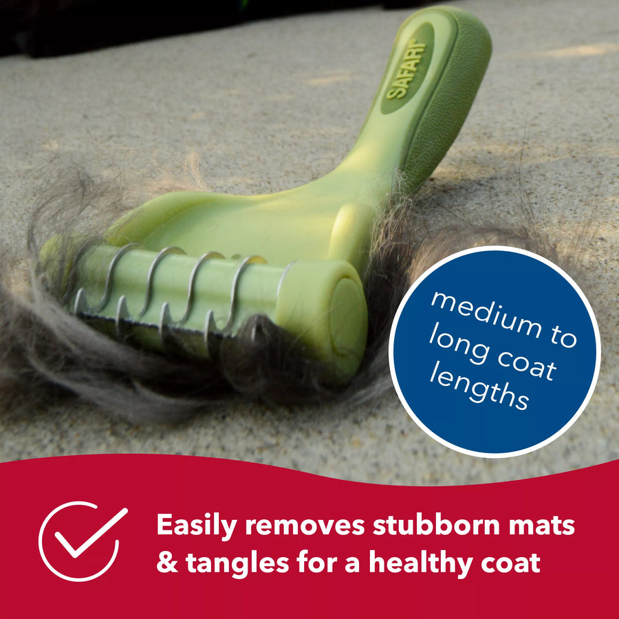 Close up of brush blades with a clump of hair. Medium to long coat lengths. Easily removes stubborn mats and tangles for a healthy coat. Safari de shedding tool for cats.