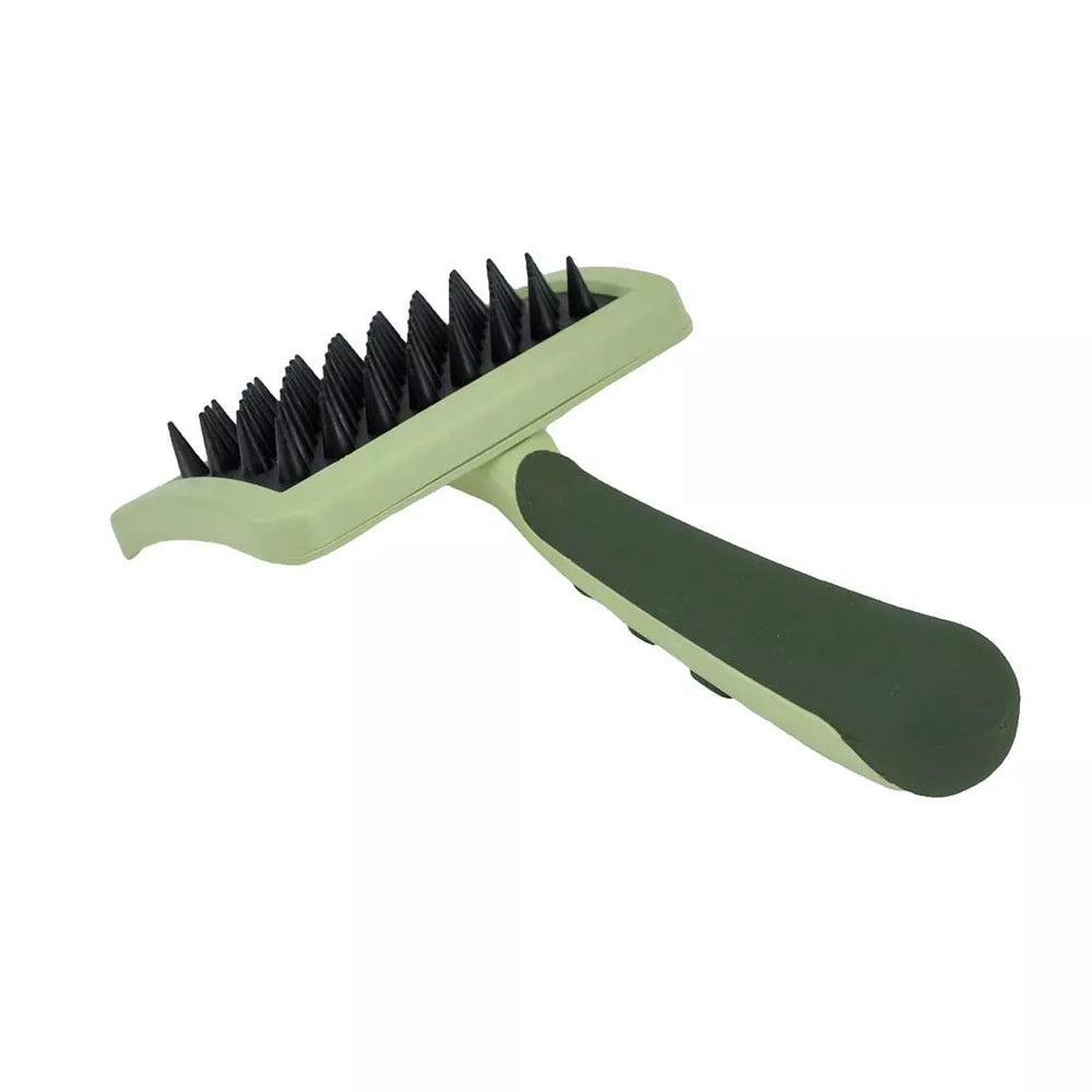 Green brush with rounded, rubberized brush tips teeth. Brush positioned laying down on back. Safari Massage Cat Brush.