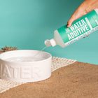 Adding Skout's Honor Oral Care Pet Water Additive Fresh & Flavorless in  bowl