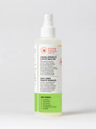 Back of bottle. 8 fluid ounce bottle with spray nozzle tip. Skout's Honor Probiotic Deodorizer Sunkissed Coconut Coat Spray.