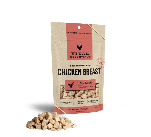 Vital Essentials Freeze-Dried Chicken Breast Dog Treats 2.1oz Front Pouch and Pile infront