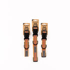 Three Wilderdog Sienna ultralight dog collars in Small, Large, and Medium sizes displayed on branded kraft paper hang tags against a white background, showing amber orange webbing with red, teal, and white zigzag pattern.