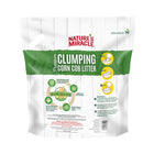 Back panel of product bag. Nature's miracle, premium clumping corn cob cat litter. 95% plant based litter. Directions for use. White bag with green stripe.