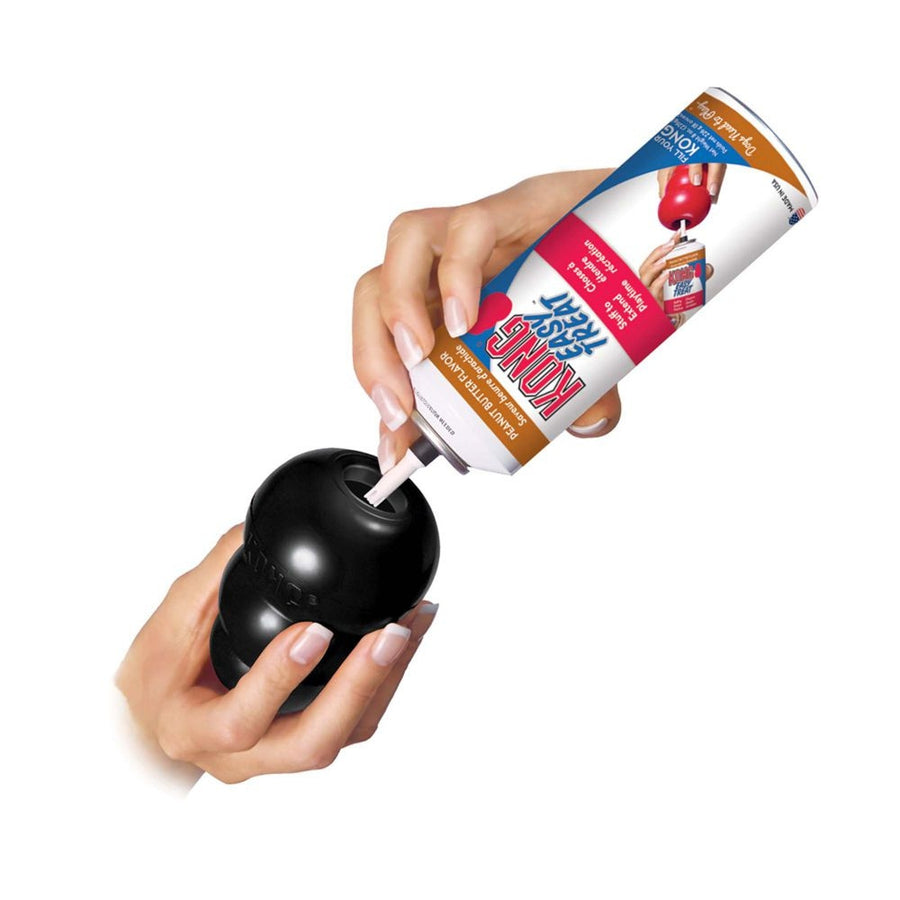 KONG Extreme Dog Toy, being filled with treat