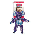 A KONG Floppy Knots Elephant Dog Toy in its original packaging. The plush toy is a purple elephant with a mix of ribbed and gingham-patterned fabric. Its limbs have knotted rope inside, and its trunk is slightly curved. The packaging features a red and white design with the 'KONG Floppy Knots' logo, and the words 'Squeaks' indicating it has a squeaker.