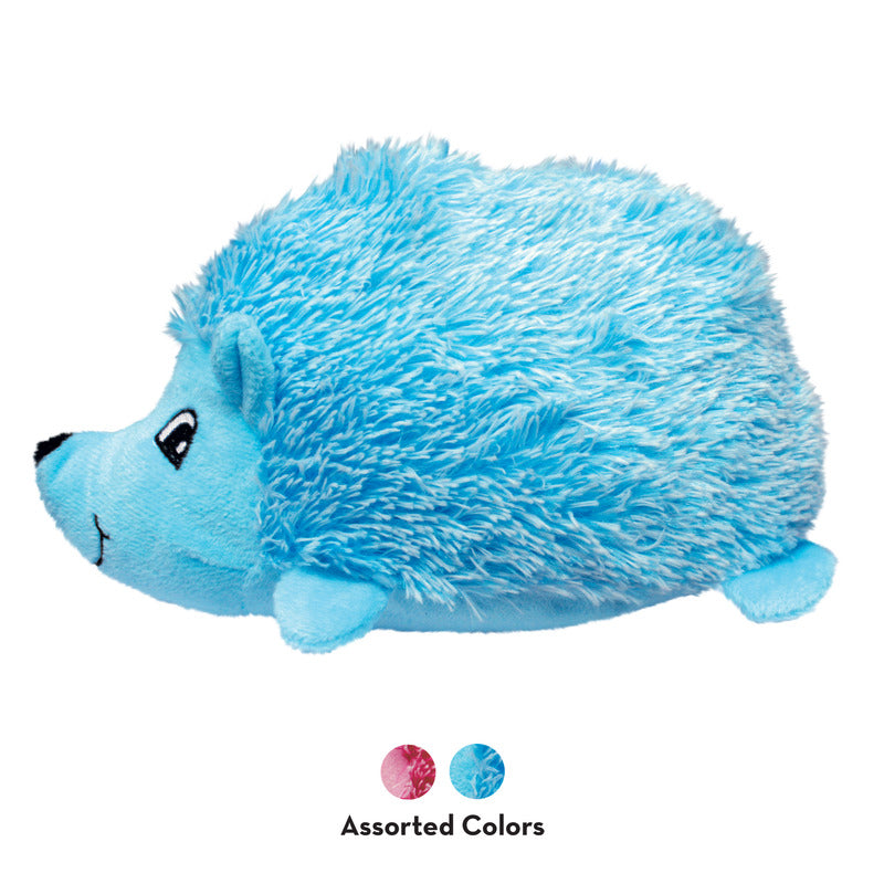 A plush dog toy shaped like a hedgehog, covered in soft, fuzzy blue fabric with a friendly face, small ears, and tiny limbs. The toy is part of the Kong Comfort Hedgehug collection and comes in assorted colors.