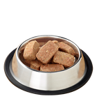 Primal Frozen Raw Pork for Dog Patties in a bowl