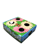 Doyen World Garden Puzzle Box cat toy with floral graphics with cutouts.